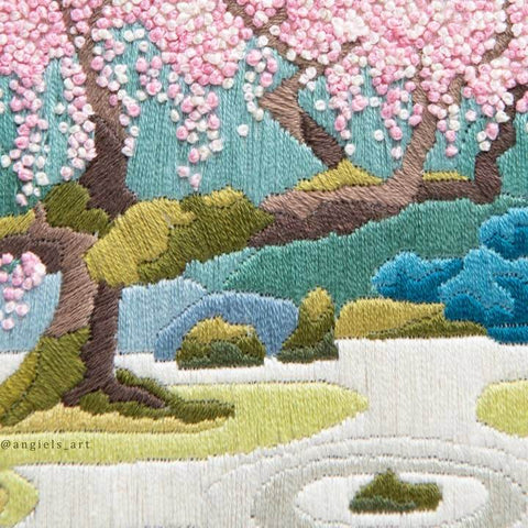 Embroidered landscape with cherry blossom tree and landscape