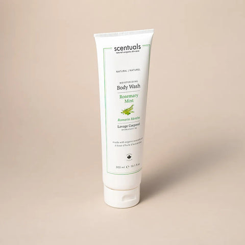 Tube of Scentuals body wash on a beige background