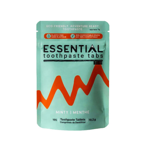Packaging of Essential toothpaste tabs with a green background and red design.