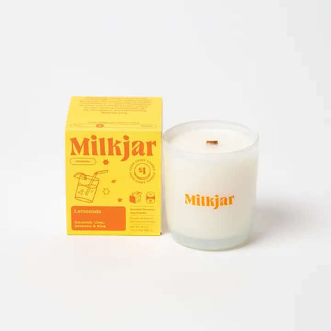 Milkjar candle and packaging on a white background
