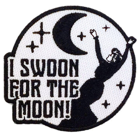 Embroidered patch with a silhouette of a person reaching towards the moon and stars, with text 'I swoon for the moon!'
