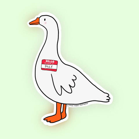 Cartoon duck with a name tag labeled 'Silly' on a light green background