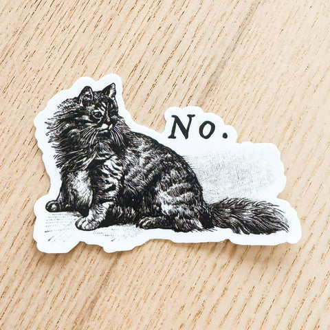 Sticker of a cat with 'No.' text on a wooden surface