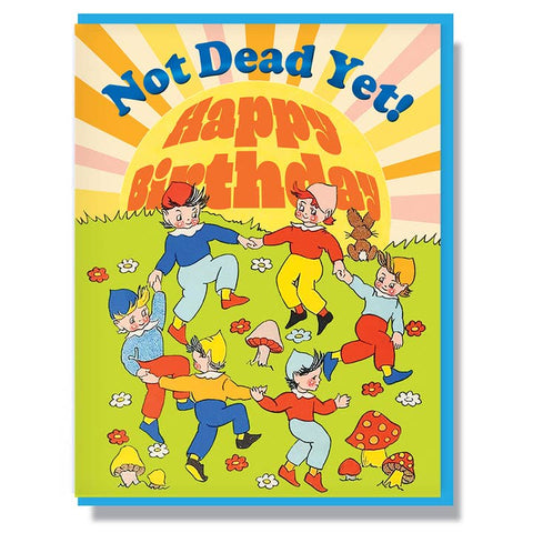 Colorful birthday card with cartoon characters and 'Not Dead Yet!' text
