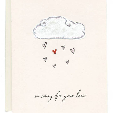 Card with cloud and hearts design and 'so sorry for your loss' text on a light pink background