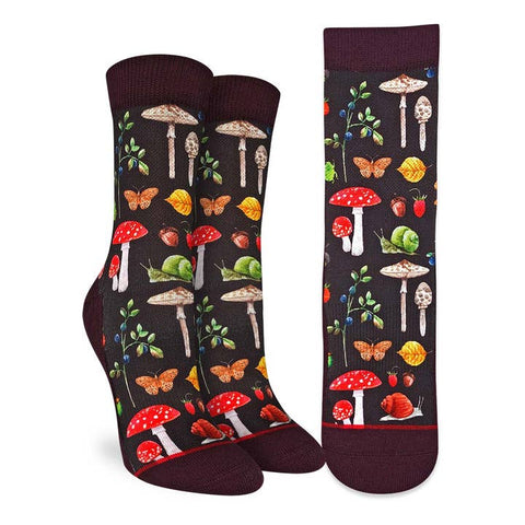 Pair of socks with mushroom and nature pattern on a white background