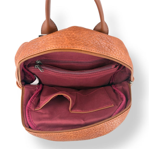 Brown textured handbag with open front pocket on a white background