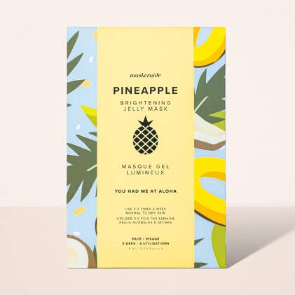 Pineapple brightening jelly mask packaging with pineapple and leaf design on a light background