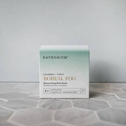 Bathorium Boreal Fog bath bomb packaging on a gray surface with a neutral background