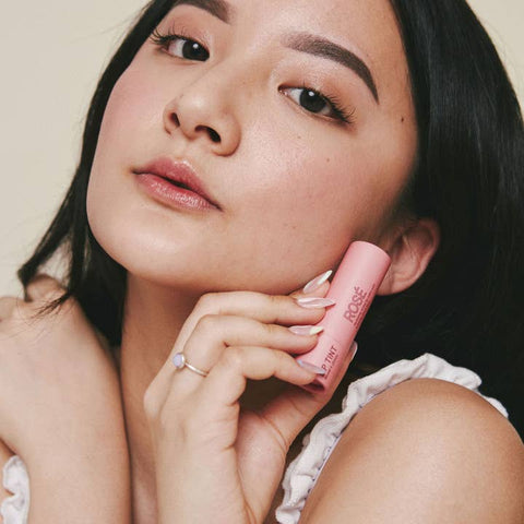 model with rose tinted lip balm by pink house organics