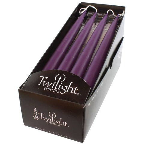 Twilight Collection purple taper candles in a black cardboard display box, photographed on a white background.