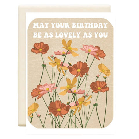 Greeting card with floral design and birthday message on a beige background
