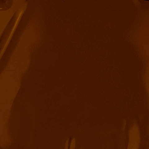 Close-up of a person's hand holding a smartphone with a blurred background