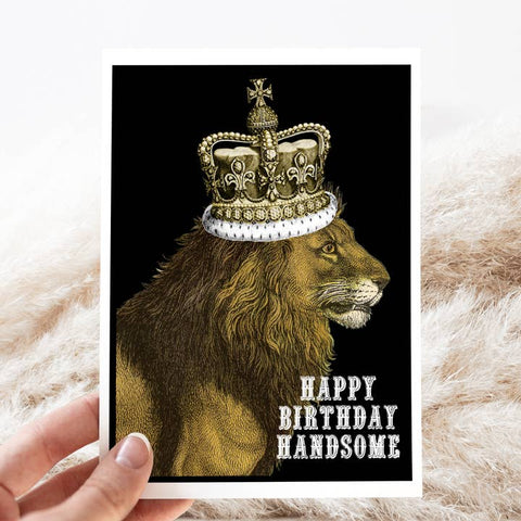 Lion wearing a crown with 'Happy Birthday Handsome' text on a black background