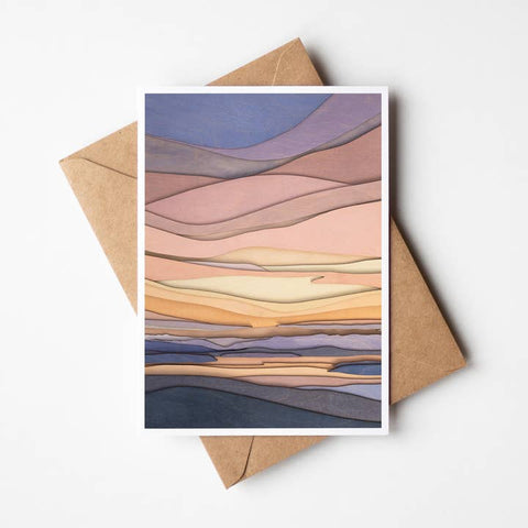 Greeting card with abstract landscape design on a brown envelope