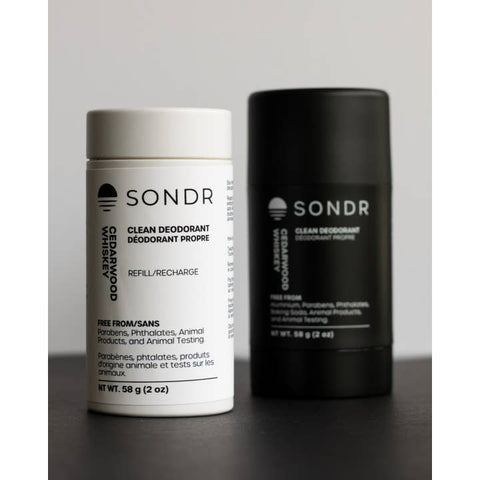 Two SONDR deodorant products on a dark surface with a light gray background