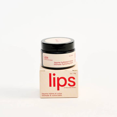 Jar of 'lips' balm with packaging on a white background