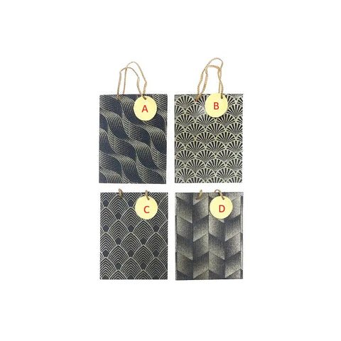 Four rectangular gift bags with geometric patterns and gold tags on a white background