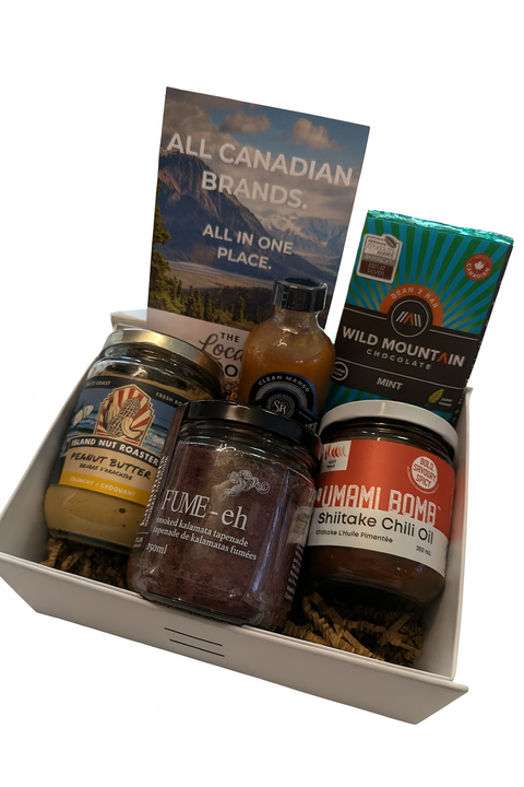 Assorted food items including jars and a box labeled 'All Canadian Brands' in a white box.