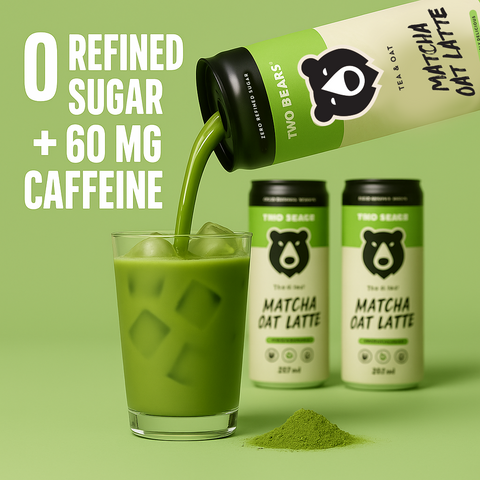 A green matcha oat latte is shown being poured from a Two Bears branded bottle into a glass of iced drink, with two matching cans and a small pile of green powder on a light green background. Large text reads '0 REFINED SUGAR + 60 MG CAFFEINE'.