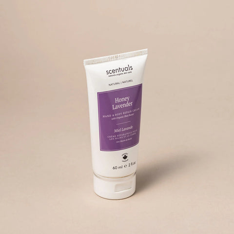 Tube of Scentuals Honey Lavender hand and body repair cream on a beige background