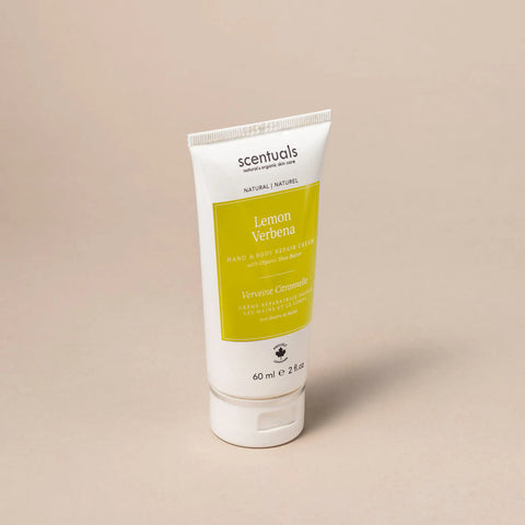 Tube of Scentuals Lemon Verbena hand and body wash cream on a beige background