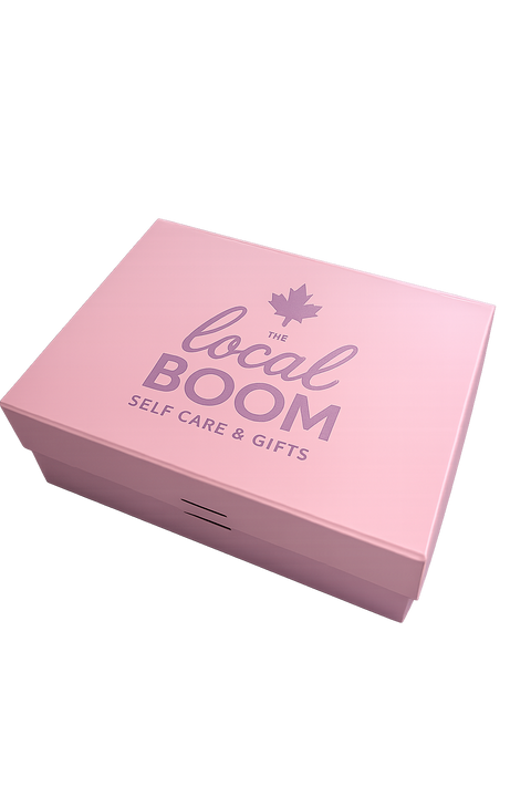 Pink box with 'the local BOOM Self Care & Gifts' text on a white background