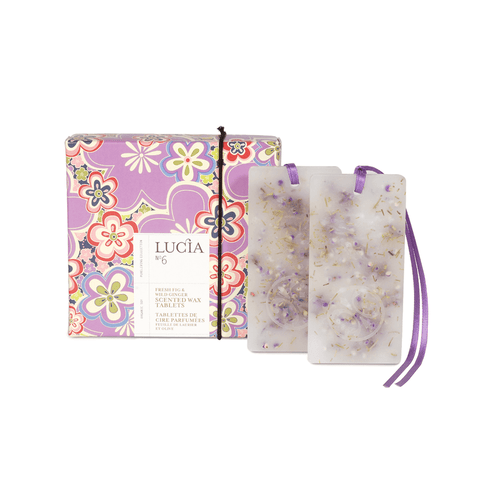 Lucia wax melts with floral packaging on a white background