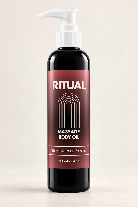 A 100ml bottle of Ritual Massage Body Oil in the Rose & Palo Santo scent. The bottle is dark amber glass with a white pump dispenser and a dusty rose and black label featuring white text.