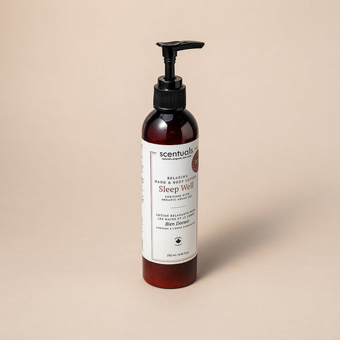 Scentuals Sleep Well lotion bottle on a beige background