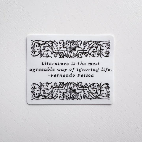 Card with decorative border and quote by Fernando Pessoa on a white background
