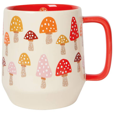 Mug with mushroom pattern and red interior and handle on a white background