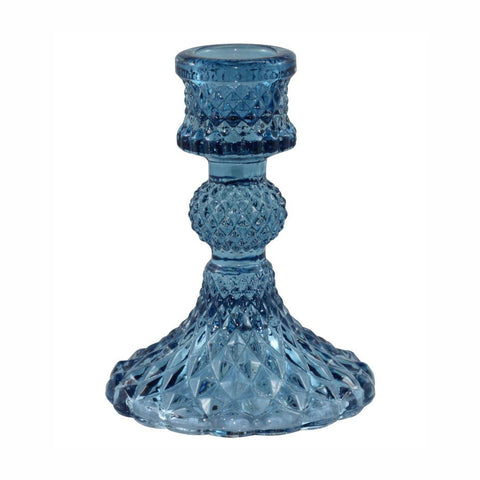 A light blue cut-glass candlestick holder with a textured, diamond-patterned base and a matching textured cup, shown on a plain white background.