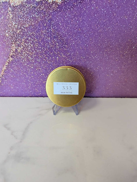 Gold container with a label on a purple and gold gradient background