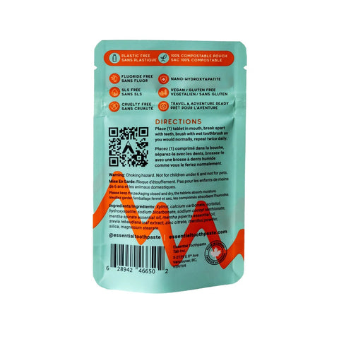 essential toothpaste tablets in compostable pouch with green and orange label