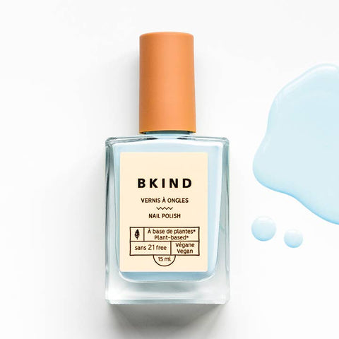BKind nail polish bottle with a beige cap on a white background