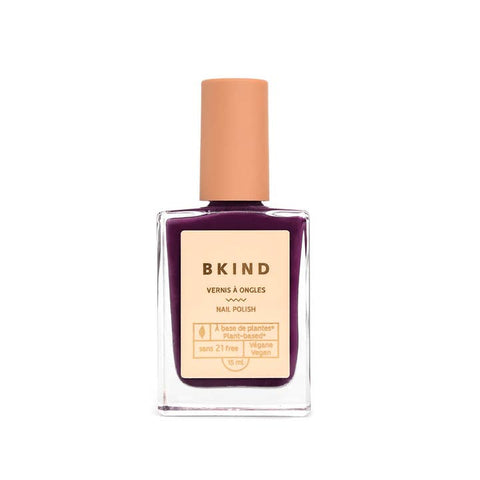 BKind nail polish bottle with beige cap on a white background