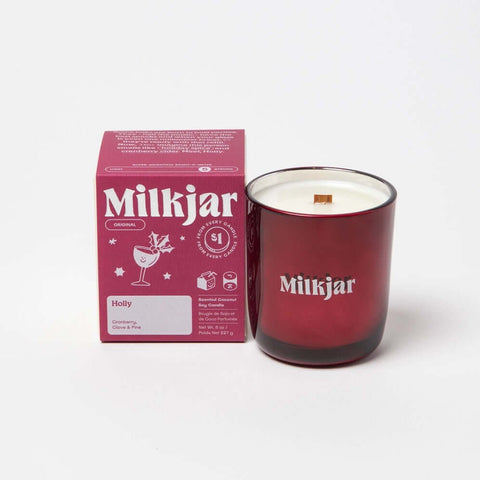 holly milk jar candle in red box with red vessel