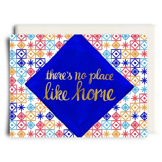 patterned house warming card with blue triangle in center