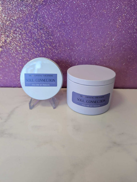 Two containers labeled 'Soul Connection' on a marble surface with a purple glittery background.
