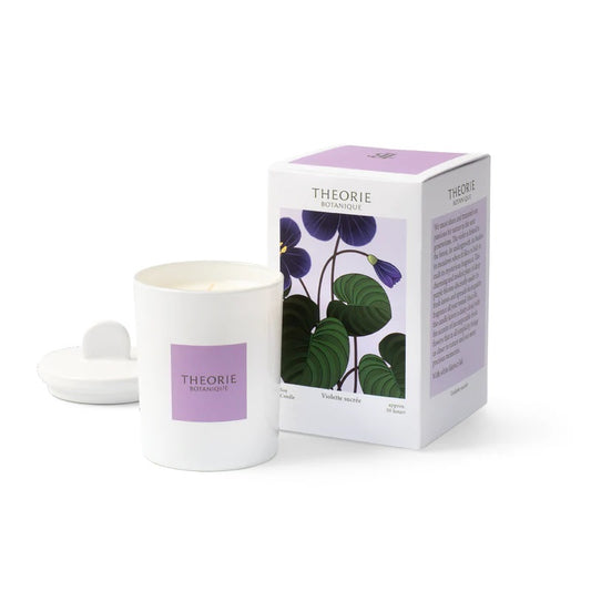 violet soy wax candle in white jar and purple box