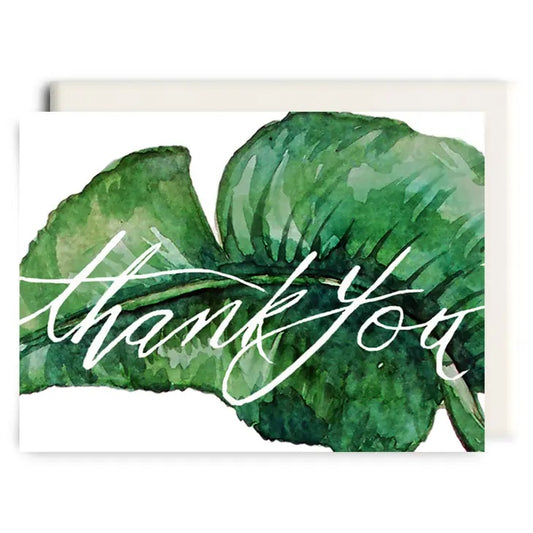thank you card with large green palm leaf