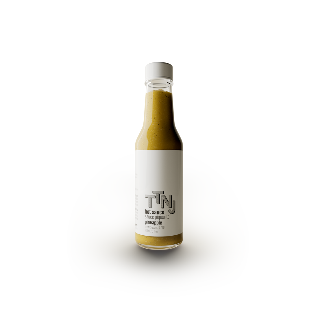 TTNJ - Pineapple Hot Sauce in glass jar with white label