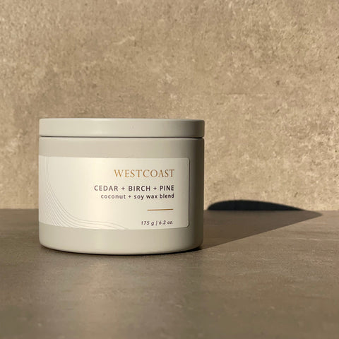 Westcoast candle with cedar, birch, and pine fragrance on a beige background