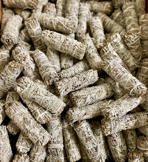 white sage bundles in a large pile